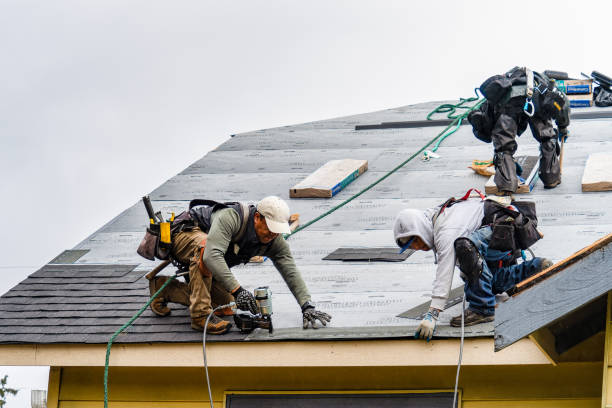 Professional Gutter Installation technician working in Redlands, CO